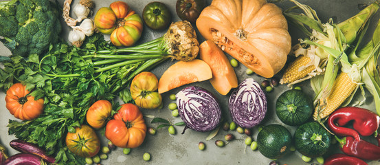 Healthy vegetarian seasonal Fall food cooking background. Flat-lay of Autumn vegetables and herb...