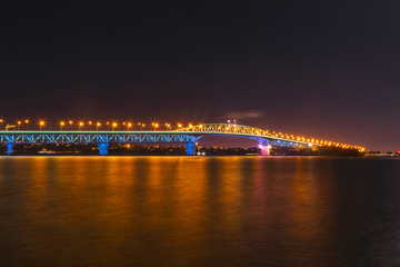 Fototapeta premium Night View to the Iconic Harbour Bridge Auckland New Zeland; Light Performance