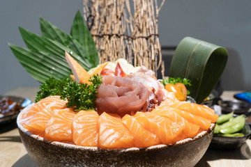 Mixed sliced sashimi on ice , japanese food in Asian restuarant