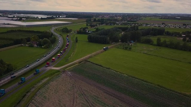 Truck parade with lots of trucks and trailers. Many transport companies participate in this parade.