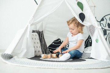 A large wigwam baby is played, in a bright room, for a birthday, a holiday © Anton