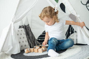 A large wigwam baby is played, in a bright room, for a birthday, a holiday © Anton