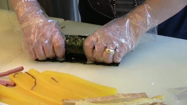 Process of making Korean style sushi roll, Gimbap, Kimbap, 4K