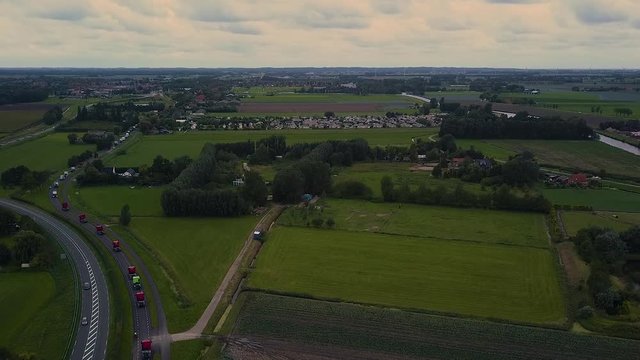 Truck parade with lots of trucks and trailers. Many transport companies participate in this parade.