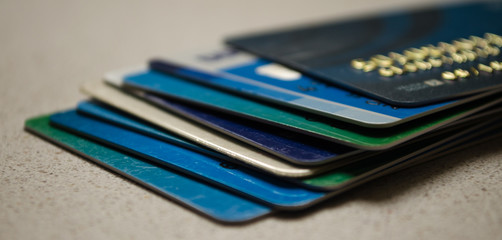 Close up of stacked credit cards.