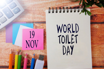 INTERNATIONAL EVENT CALENDAR CONCEPTUAL : WORLD TOILET  DAY  , 01 Nov with background of office stationeries.