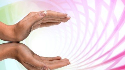 The light in young woman hands in