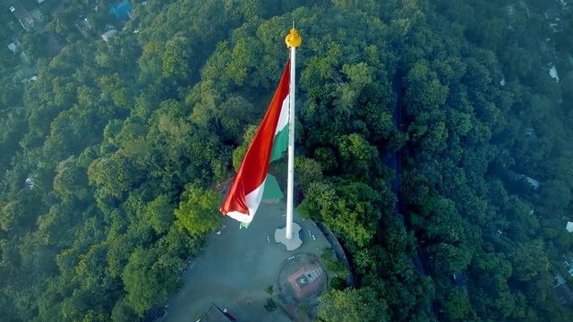 A Top Drone Footage Of Indian National Flag On a Hill Top