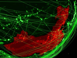 China on green model of planet Earth with network at night. Concept of green technology, communication and travel.