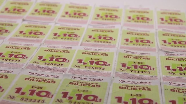 Rows of Vilnius Bus Ride a One-Time Tickets Purchased For The Old National Currency Litas. Close Up Footage.