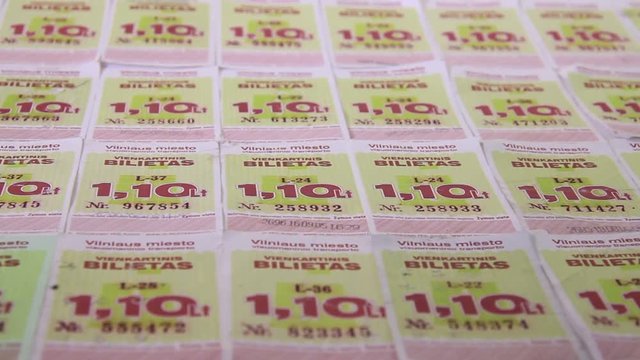 Rows of Vilnius Bus Ride a One-Time Tickets Purchased For The Old National Currency Litas. Close Up Footage.