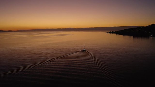 Flying away from sailboat on Lake L&radic;&copy;man with beautiful sunset colors
In front fo Cully, Lavaux - Switzerland