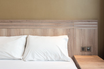 White pillows on a bed Comfortable soft pillows on the bed.