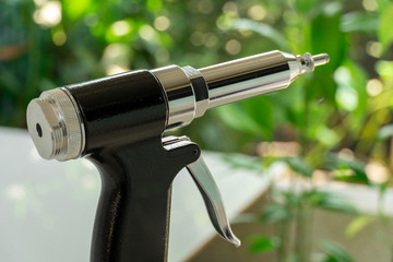 Close up rivet gun ,Portrait rivat gun on natural background