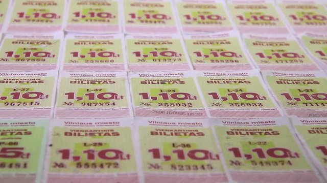 Rows of Vilnius Bus Ride a One-Time Tickets Purchased For The Old National Currency Litas. Close Up Footage.