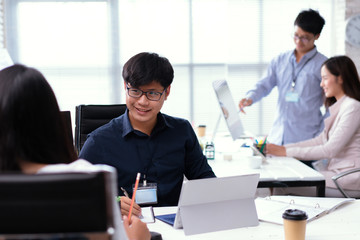 Asian people working in office