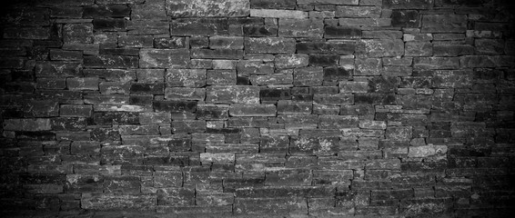 Black stone wall texture and background