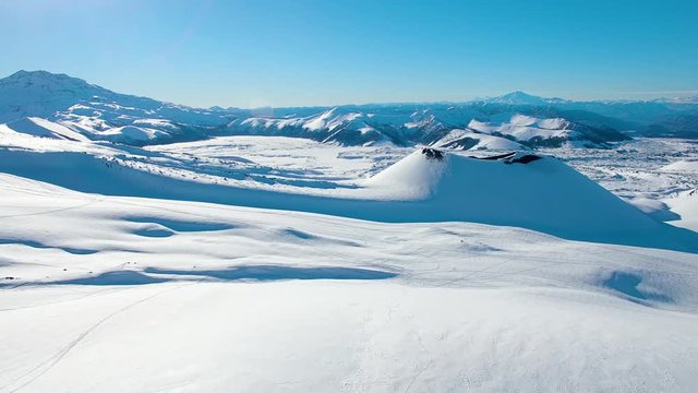 Late afternoon scouting and exploring mountain ranges, late July at Lonquimay Volcano in Malalcahuello, south of Chile.