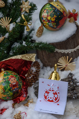Christmas Decorations: Balls, fir branches, ribbons, straw toys and postcards