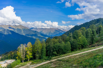Mountain landscape against cloudy blue sky in Krasnaya Polyana Sochi