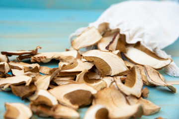 Dried mushrooms, on a blue wooden table