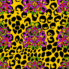 Brush painted tiger seamless pattern. Yellow leopard spots and doodle ribbon background.