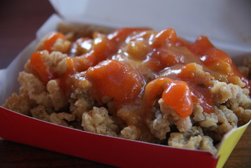 chicken popcorn with sauce in a box