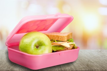 Green apple and food on the  desk