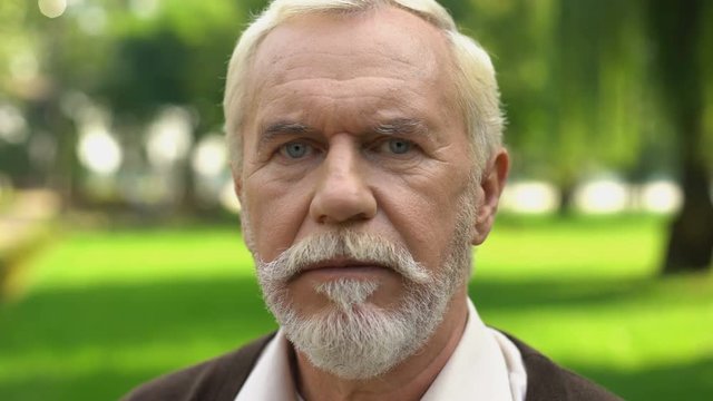 Boy face changes into old man, aging and generations, time transience concept