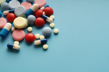 Drugs / medicine on blue