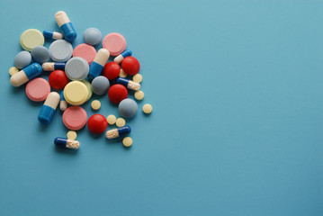 Drugs / medicine on blue