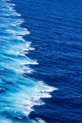 waves behind the boat
