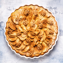 Apple pie with walnuts and cinnamon.