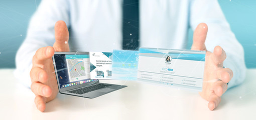 Businessman holding a Website application going out a laptop screen 3d rendering