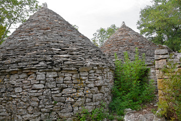 The Twin Kazuni (Kazuni Blizanci) near Vodnjan in Istria, Croatia. Kazuni are traditional dry wall shelters constucted for farmers and shepherds
