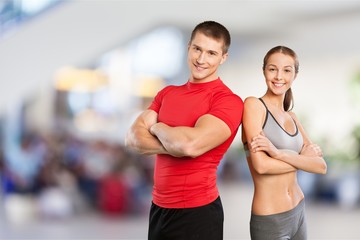 Young sporty couple in gym