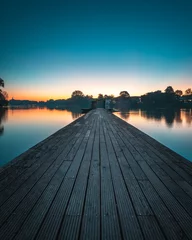 Fotobehang pier at sunset © Steffen