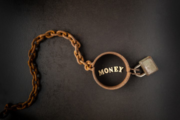Fototapeta na wymiar Addiction or slavery on the money