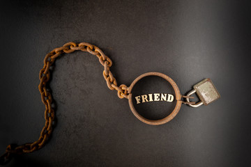 Fototapeta na wymiar Addiction or slavery on the friend / strong social bond