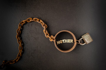 Fototapeta na wymiar Addiction or slavery on the mother / strong social bond