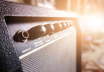 Guitar amplifier in recording studio background with beautiful sunlight and copy space, Music...