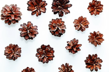 Natural fir cones on a white background. Christmas decoration