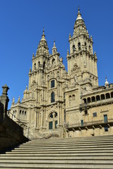 Fototapeta premium Cathedral, side view from stone stairs. Plaza del Obradoiro. Santiago de Compostela, Spain.