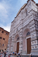 Fototapeta premium Facade of the Baptistery in Siena