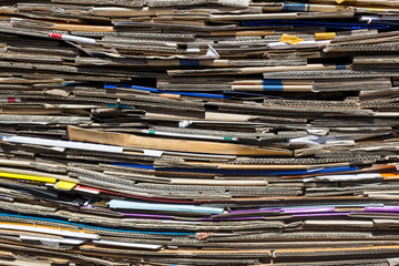 Stack of paper waste before shredding at recycling plant