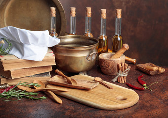White chef's hat and old cookbooks.