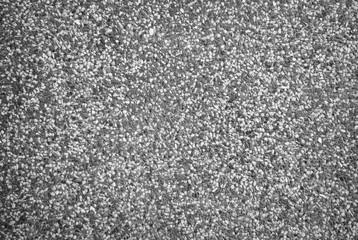 Small gravel wall mix with black, gray and white stone to make a wall or column and floor in the structure building. copy space