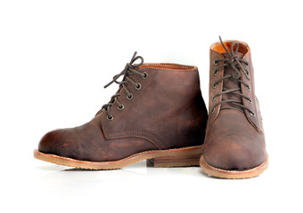 Brown oil full grain men’s boot with steel toe for biker isolated on white background. Fashion advertising boot photos.