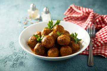 Meatballs with tomato sauce and parsley