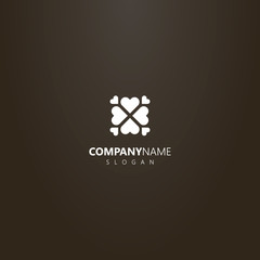 Fototapeta premium white logo on a black background. simple vector flat art logo of heart-shaped clover with four hearts around